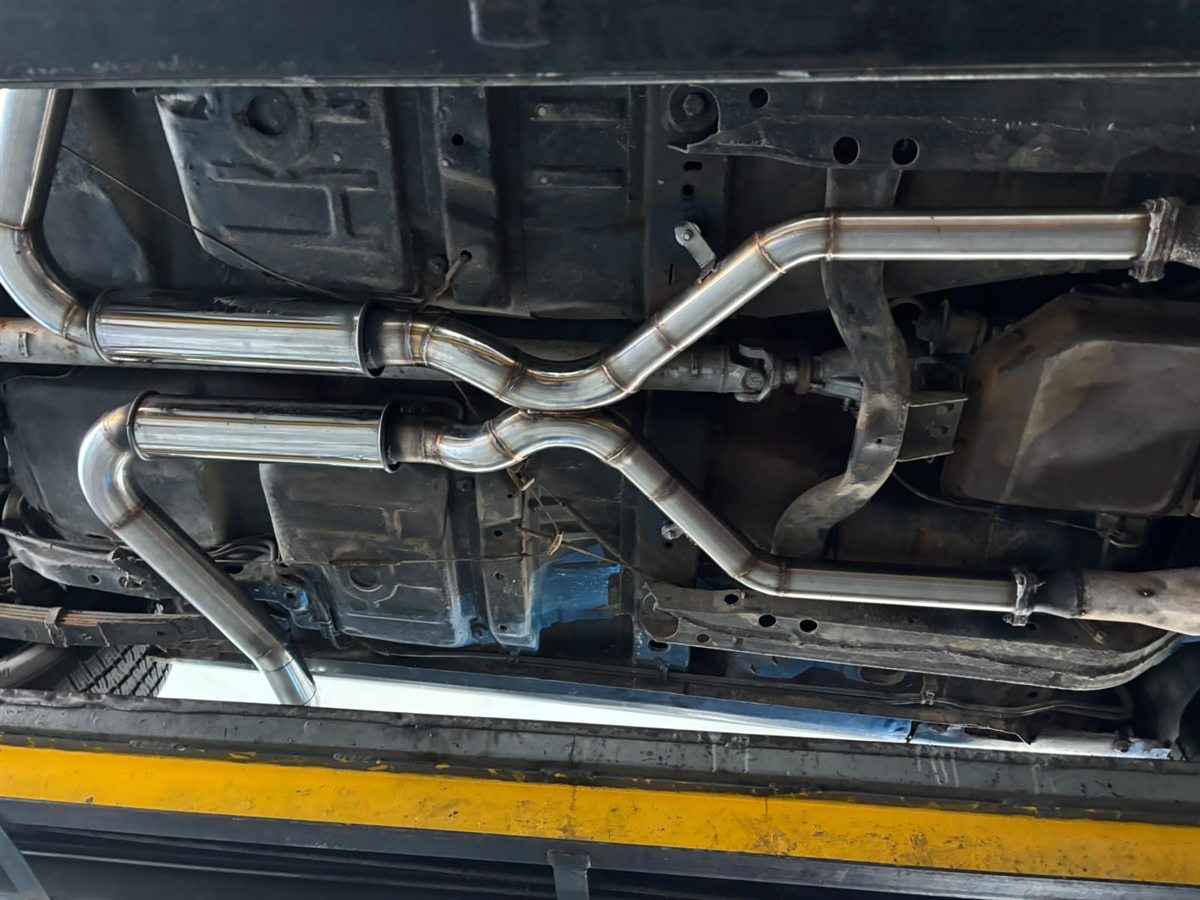 Full custom exhaust system fitted under a car